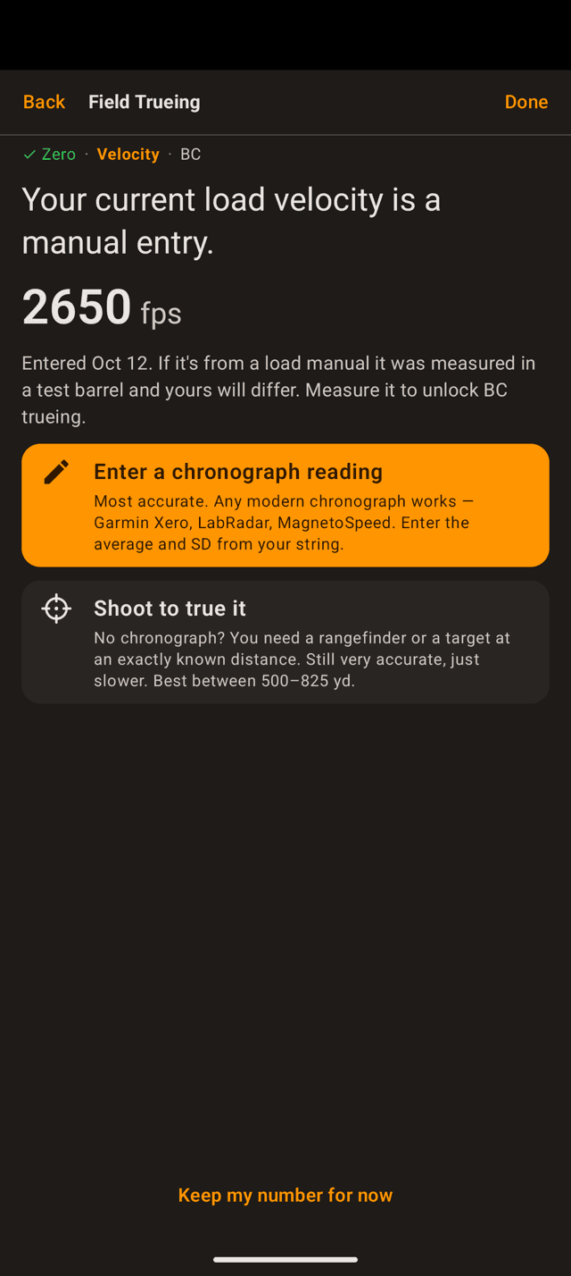Velocity screen on an Android phone reading Your current load velocity is a manual entry, 2650 fps, with two cards, Enter a chronograph reading and Shoot to true it, and Keep my number for now at the bottom